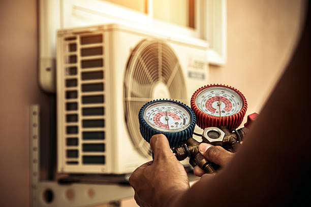 Professional Hvac technician working in Bell, CA